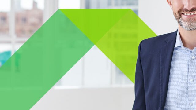 A professional man in suit featured in an article about questions to ask a financial professional
